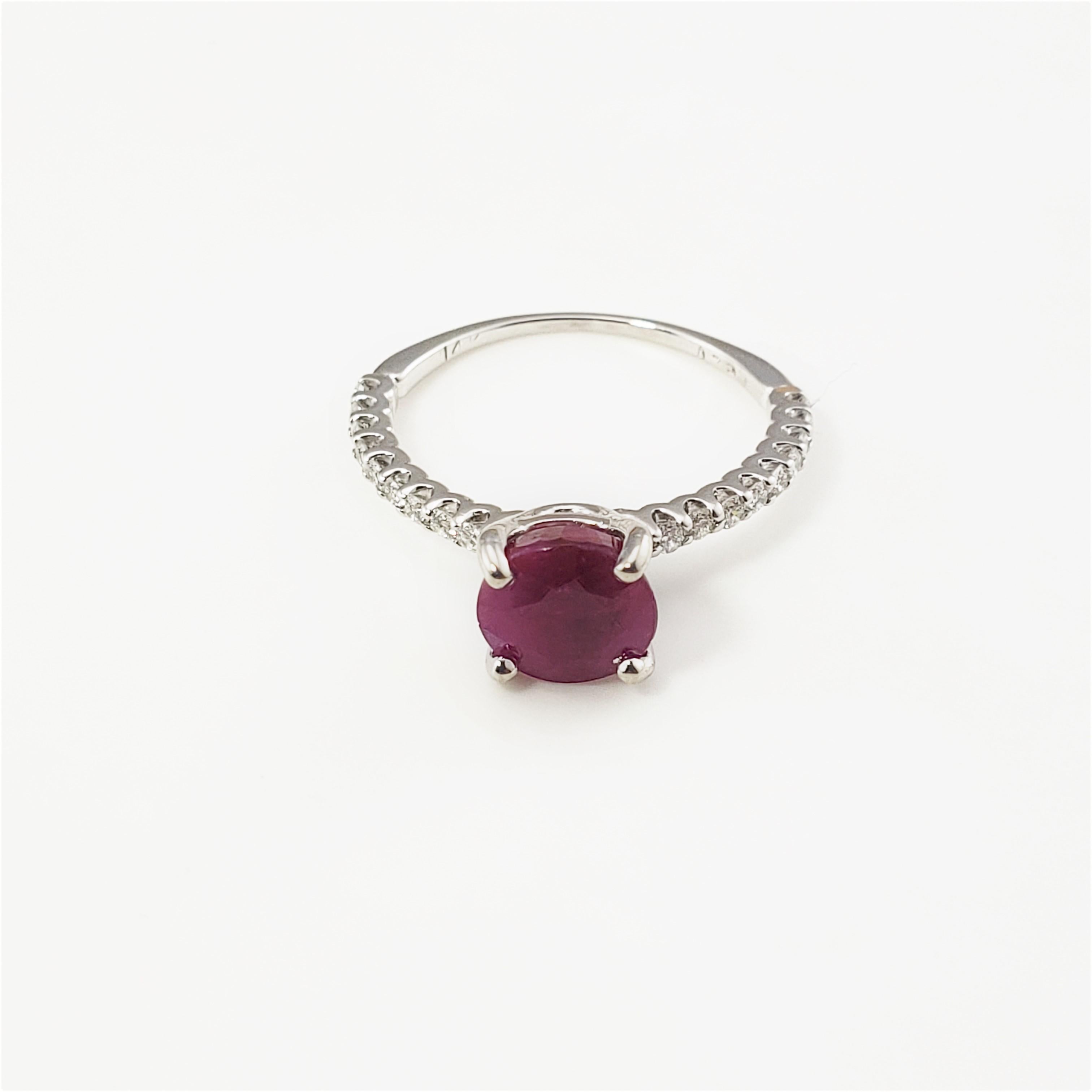 14 Karat White Gold Ruby and Diamond Ring Size 5.5 GAI Certified-

This lovely ring features one round ruby (7 mm) and 18 round brilliant cut diamonds set in classic 14K white gold.  Shank:  1 mm.

Ruby weight:  2.07 ct.

Total diamond weight:  .20