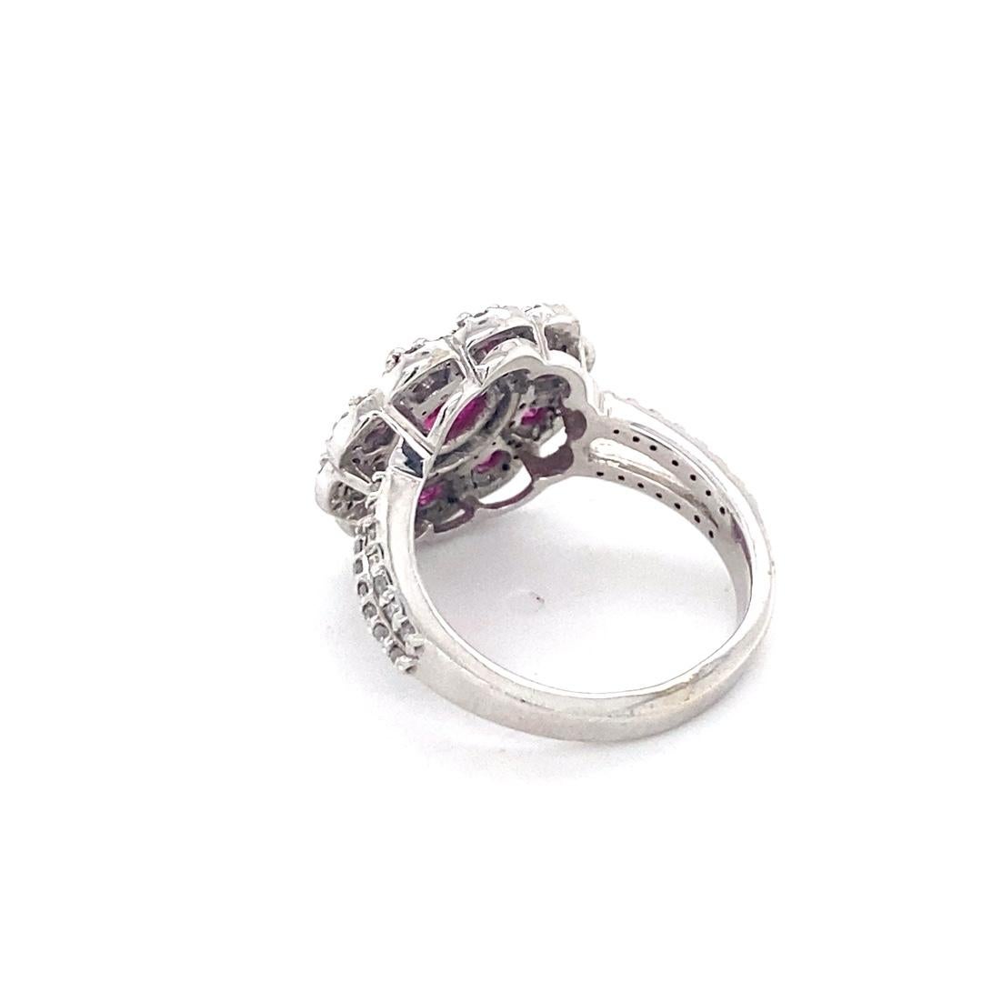 Women's 14 Karat White Gold Ruby Diamond Flower Ring For Sale