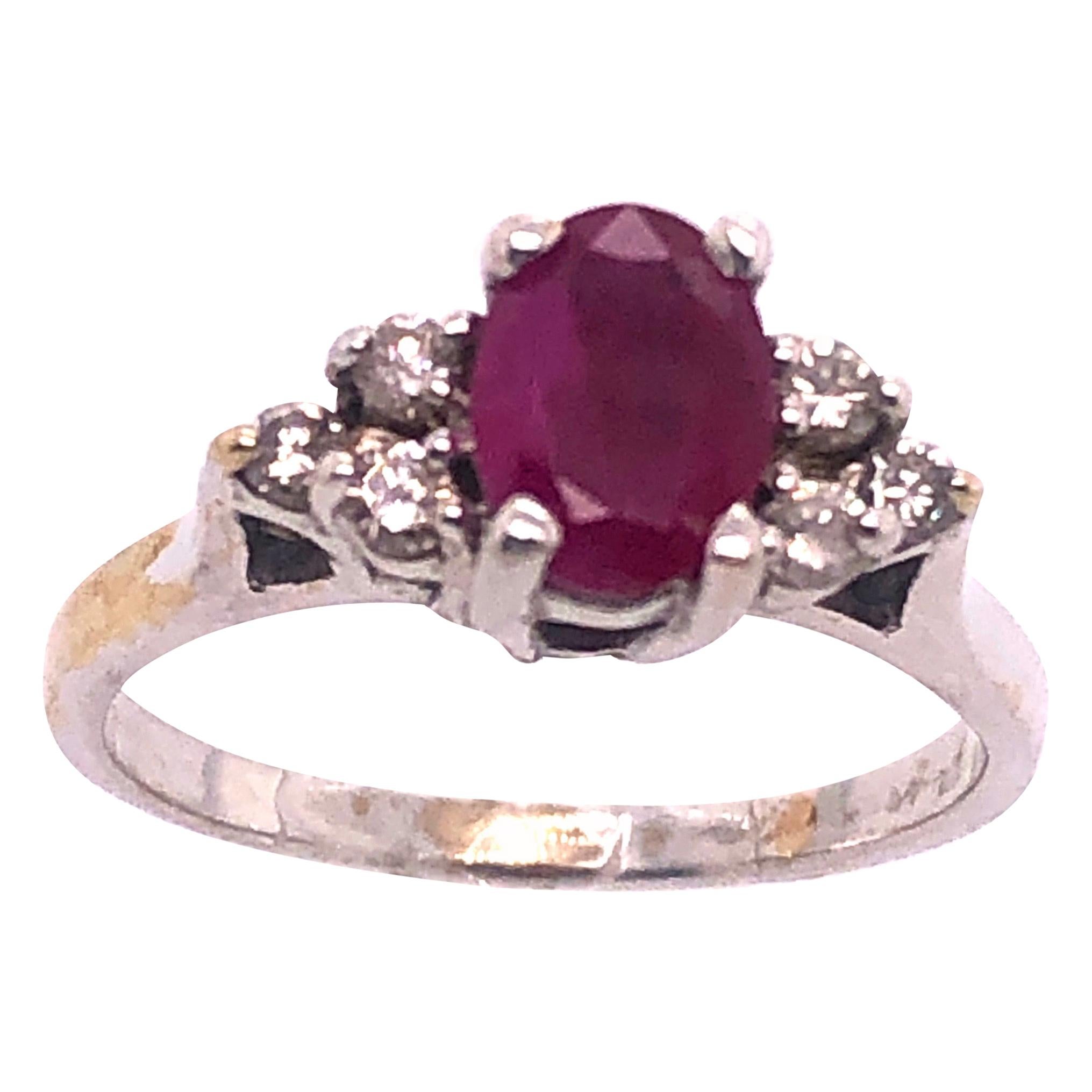 14 Karat White Gold Ruby Solitaire Ring with Diamond Accents For Sale