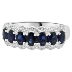 Anillo de oro blanco de 14 quilates con zafiro y diamantes