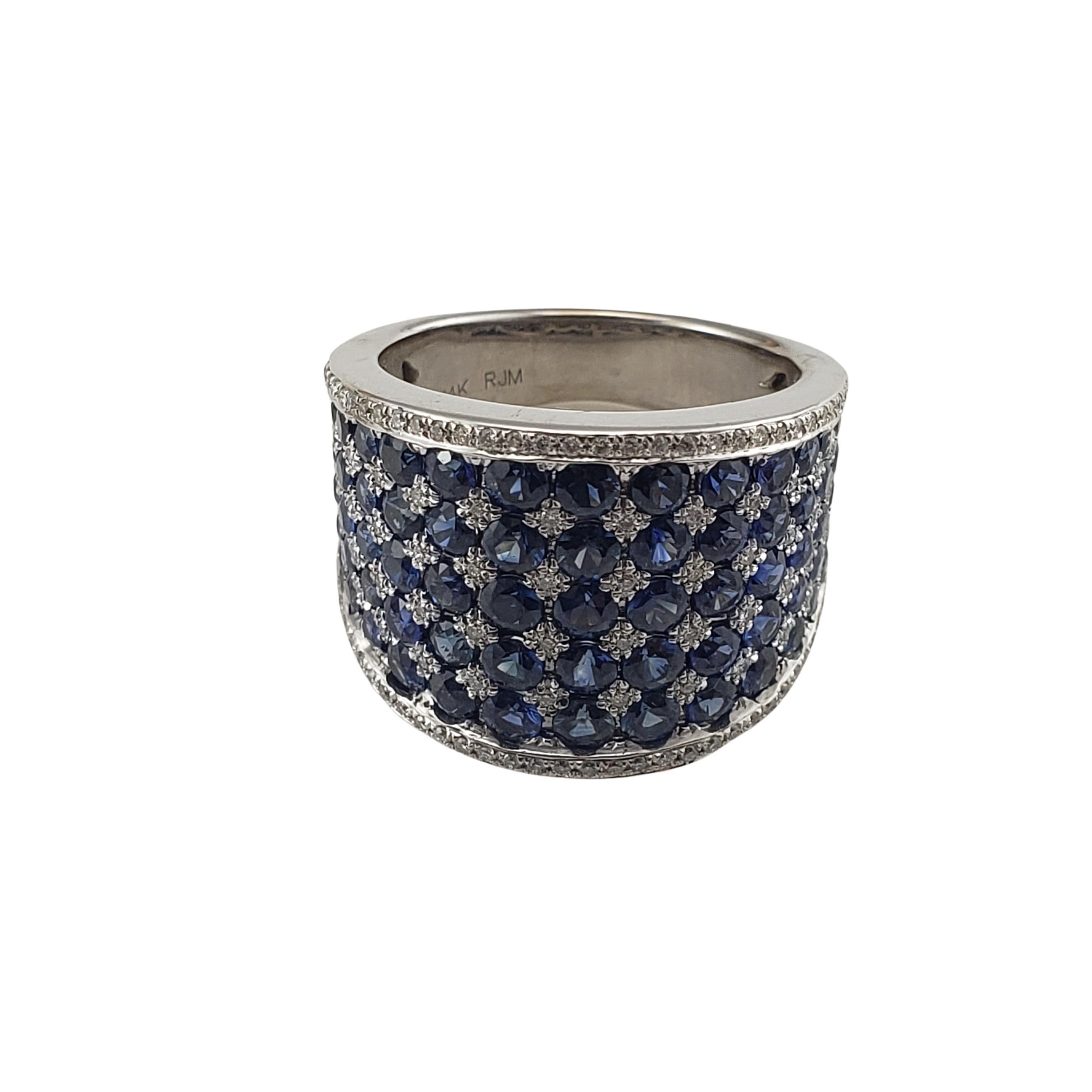 14 Karat White Gold Sapphire and Diamond Band Ring Size 7 GAI Certified-

This stunning cigar band ring features 62 round brilliant cut diamonds and 65 blue sapphires set in classic 14K white gold.  
Width:  16 mm.  Shank:  5 mm.

Total diamond