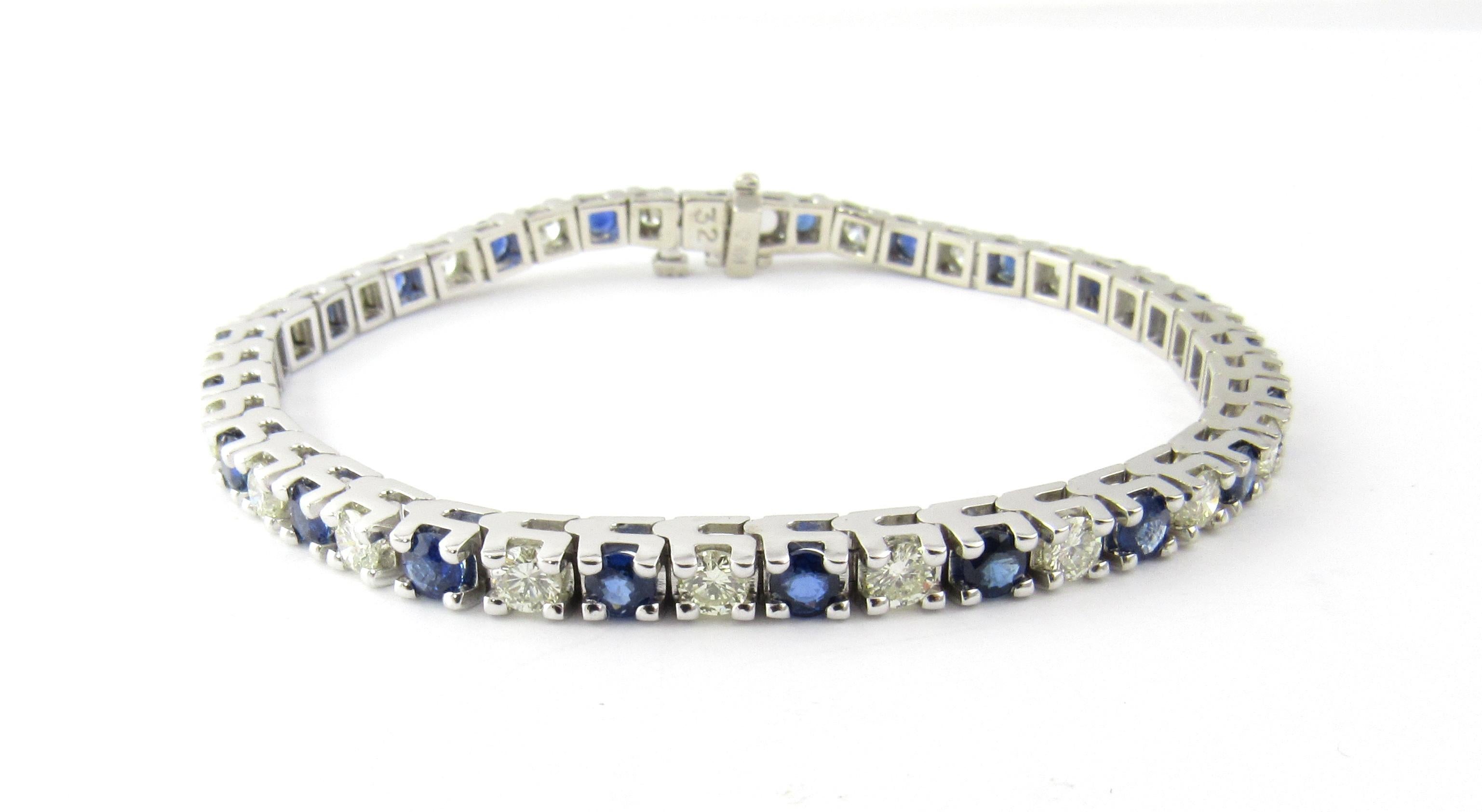 Vintage 14 Karat White Gold Sapphire and Diamond Bracelet

This stunning tennis bracelet features 22 round brilliant cut diamonds and 22 round genuine blue sapphires set in classic 14K white gold. Safety closure. Width: 3 mm.

Approximate total