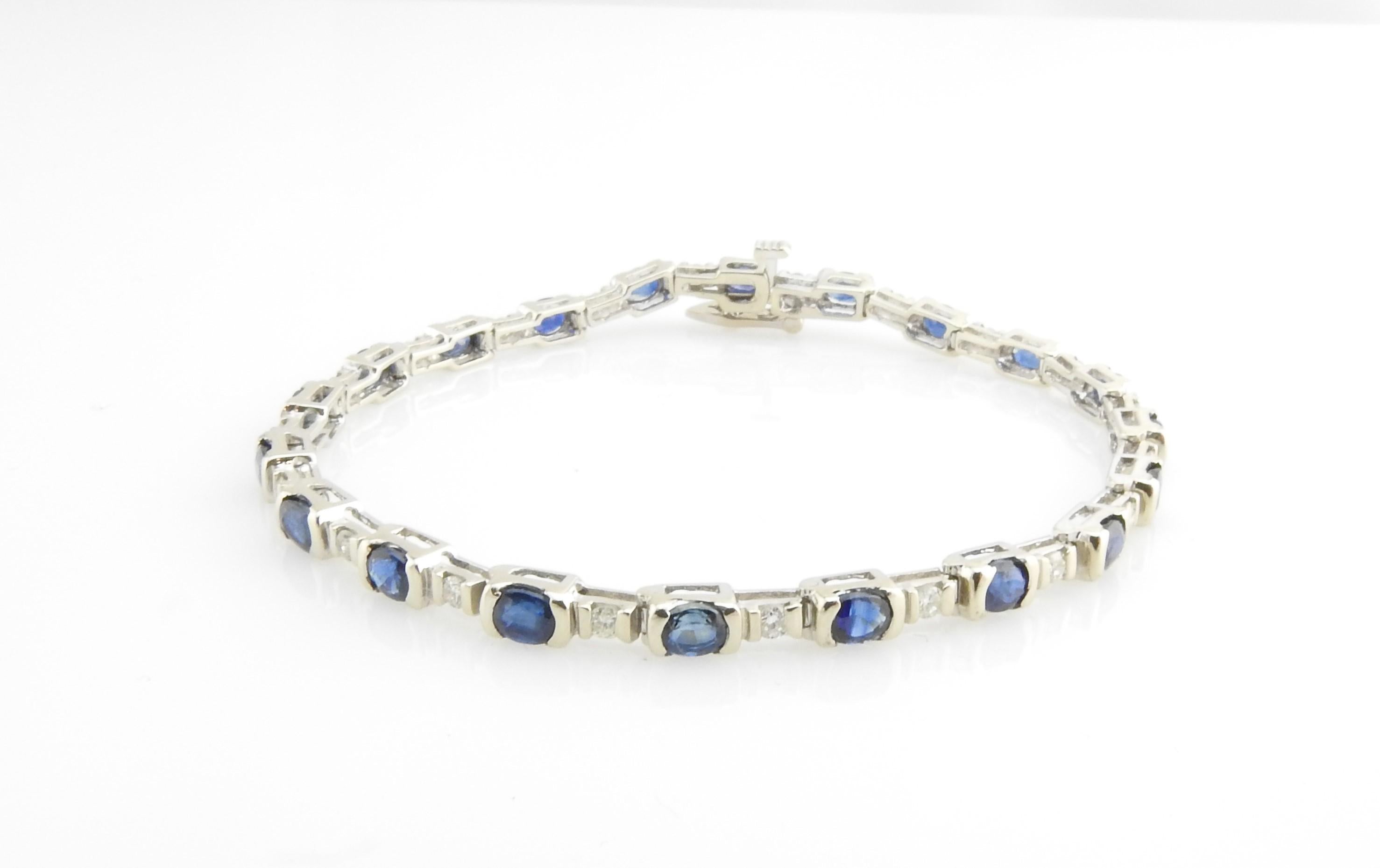Vintage 14 Karat White Gold Sapphire and Diamond Bracelet

This elegant bracelet features 20 round sapphires (3 mm each) and 20 round brilliant cut diamonds set in classic 14K white gold. Safety closure.

Approximate total diamond weight: .60