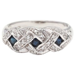 14 Karat White Gold, Sapphire and Diamond Criss Cross Band Ring