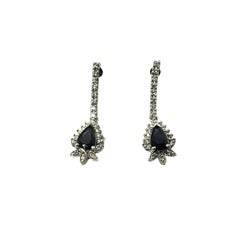 14 Karat White Gold Sapphire and Diamond Dangle Earrings