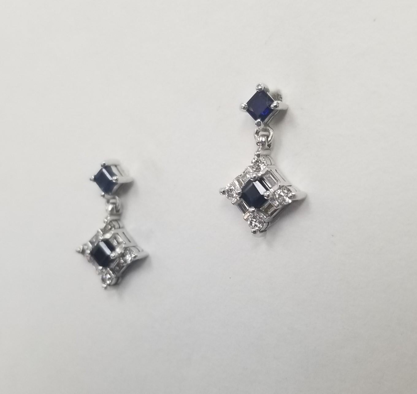 This elegant blue sapphire drop earrings features 8 pieces of round diamonds and 8 pieces of baguettes diamond. The earrings are crafted in a very classic design in 14k white gold. 
Specifications:
    main stone: 4 PIECES SAPPHIRE 0.50 CTW
   