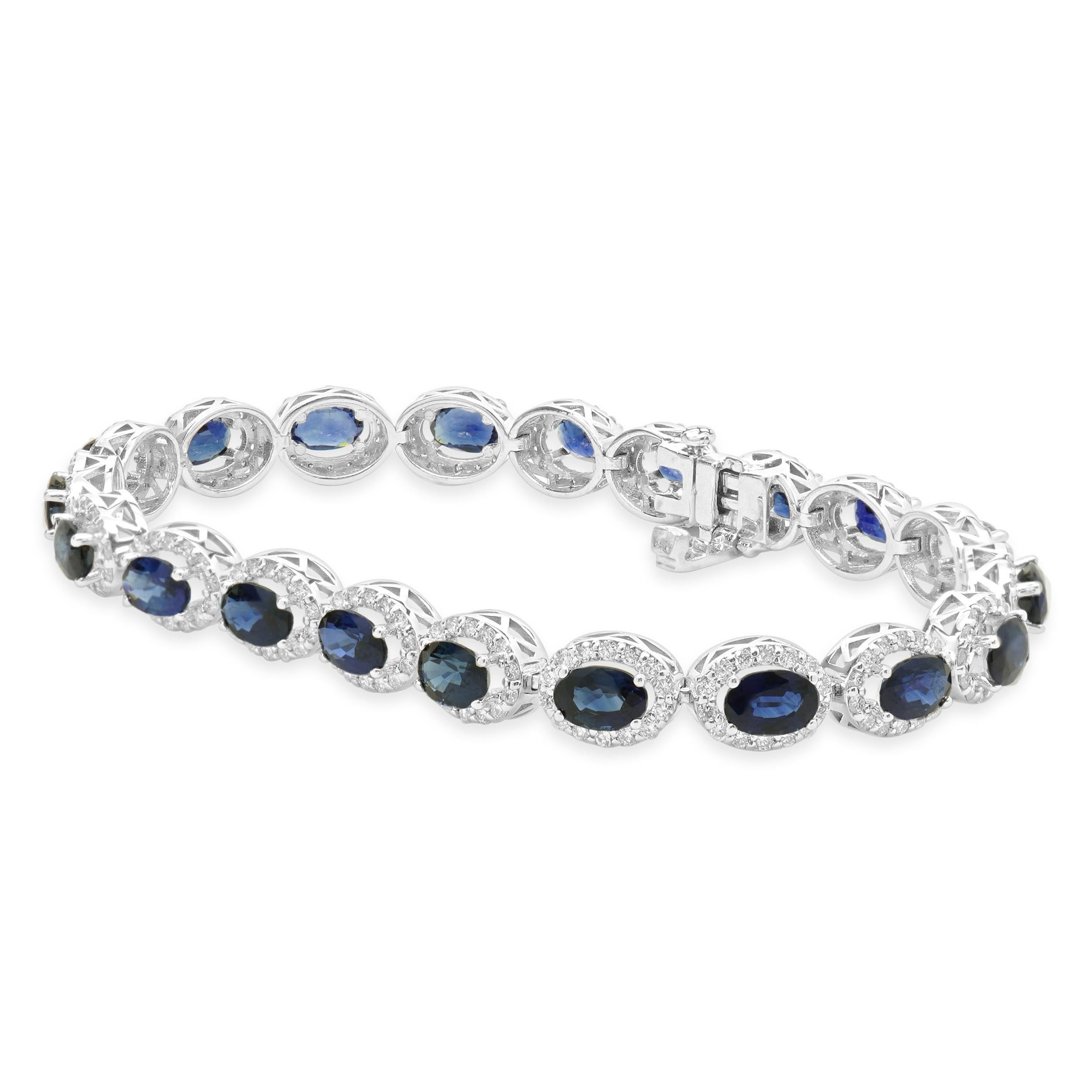Designer: custom
Material: 14K white gold
Diamond: round brilliant cut = 2.38cttw
Color: G
Clarity: SI1
Sapphire: oval cut = 13.12cttw
Length: bracelet will fit up to a 7-inch wrist
Weight: 15.54 grams