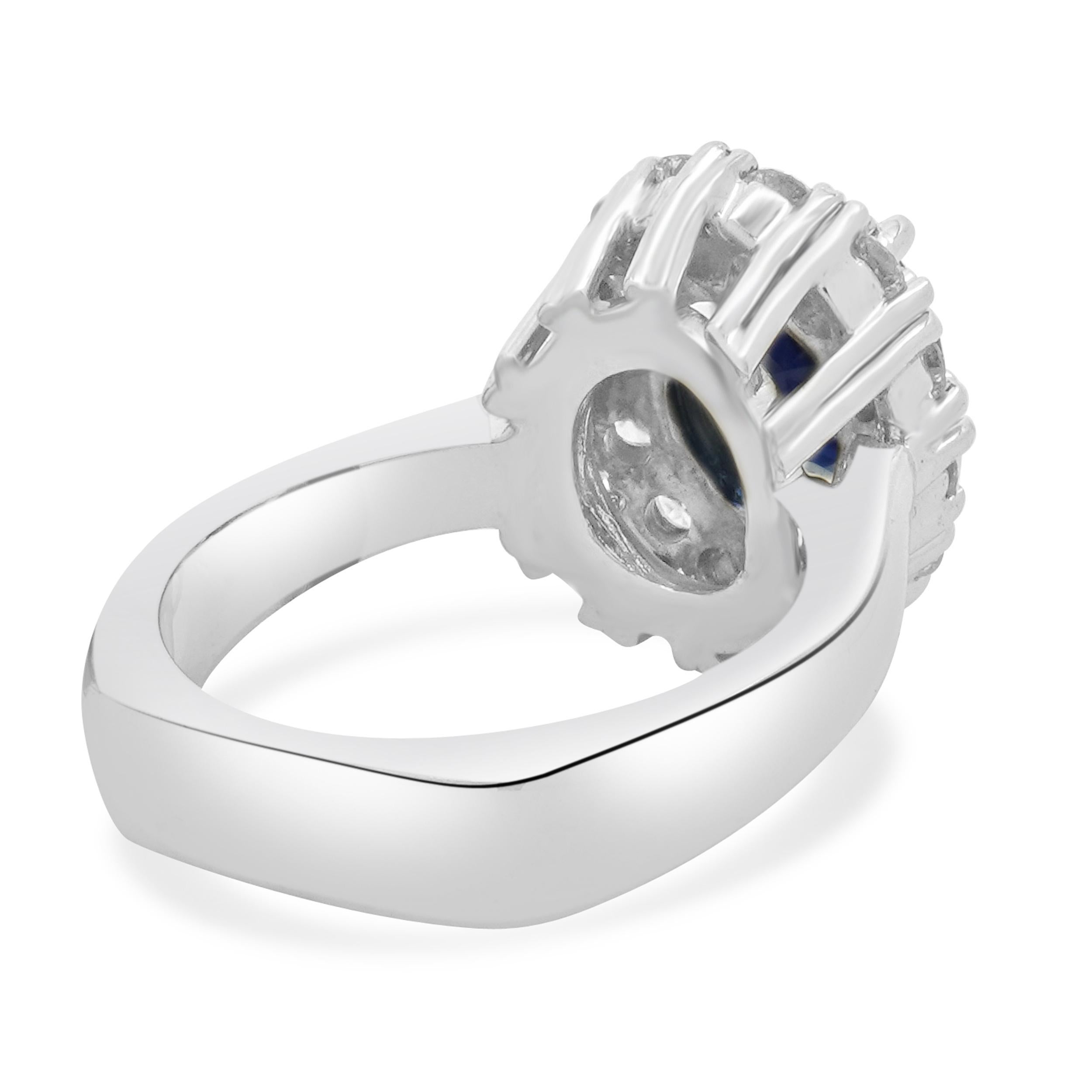 Oval Cut 14 Karat White Gold Sapphire and Diamond Halo Ring For Sale