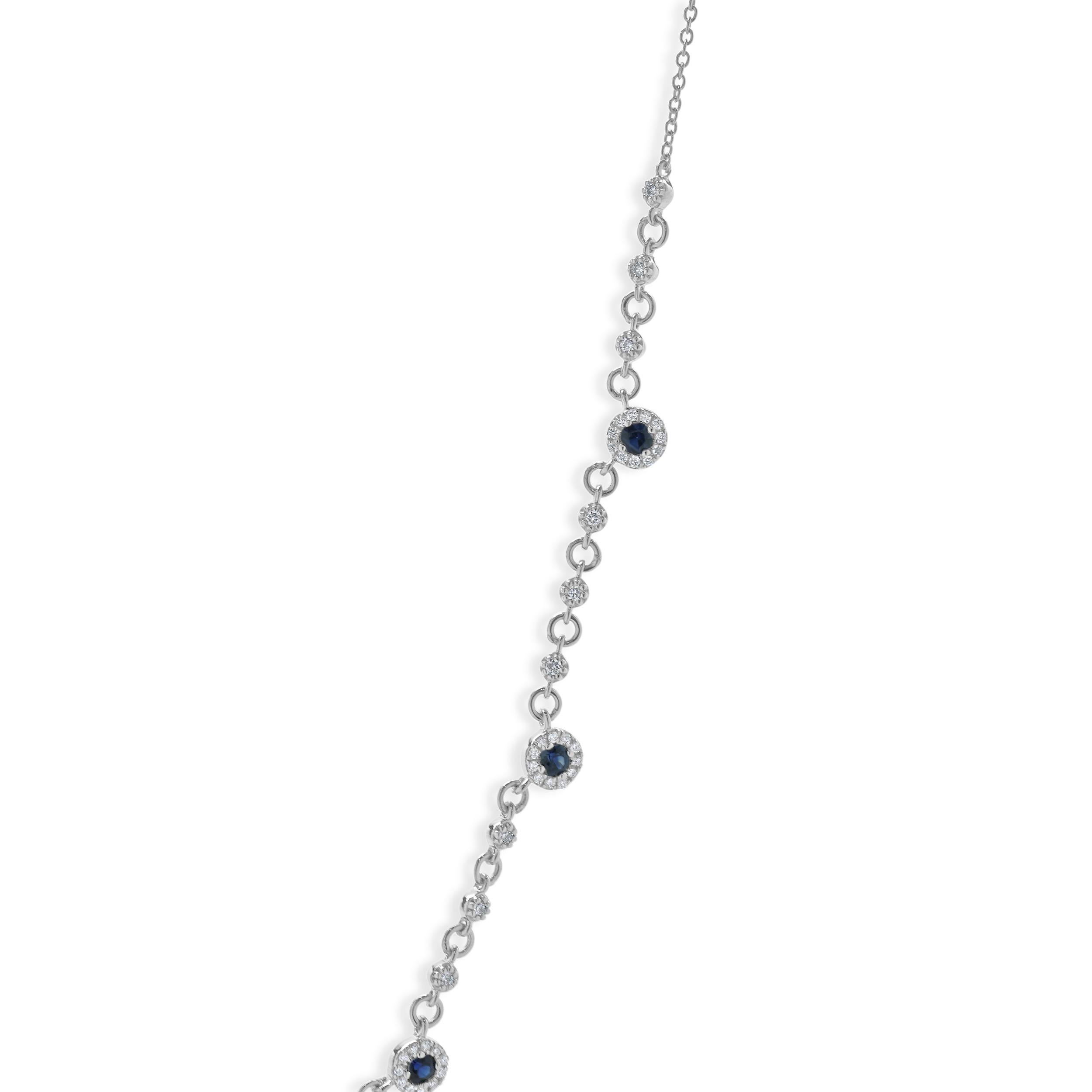 Designer: custom
Material: 14K white gold
Diamond: round brilliant cut = 0.37cttw
Color: G
Clarity: SI1
Sapphire: round cut = 0.42cttw
Weight: 4.36 grams