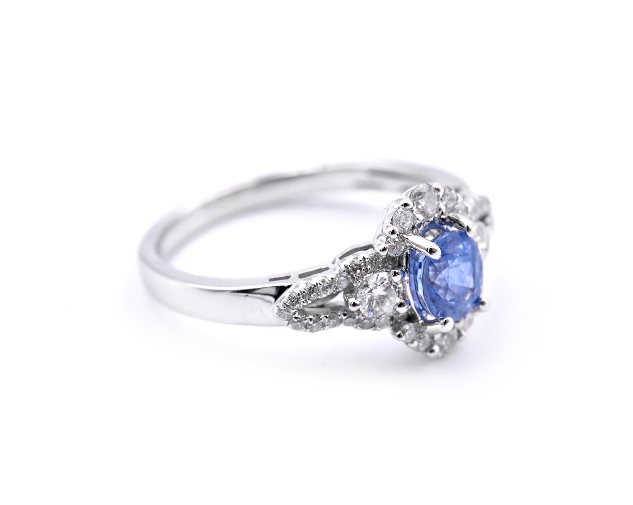 Material: 14k white gold
Gemstones: Sapphire = .70ct Oval
Certification: AGI 25324
Diamonds: 42 round brilliant cuts = .52cttw
Color: F
Clarity: VS2-SI
Ring Size: 7.5 (please allow two additional shipping days for sizing requests)
Dimensions: ring