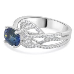 Ring aus 14 Karat Weißgold mit Saphiren und Diamanten