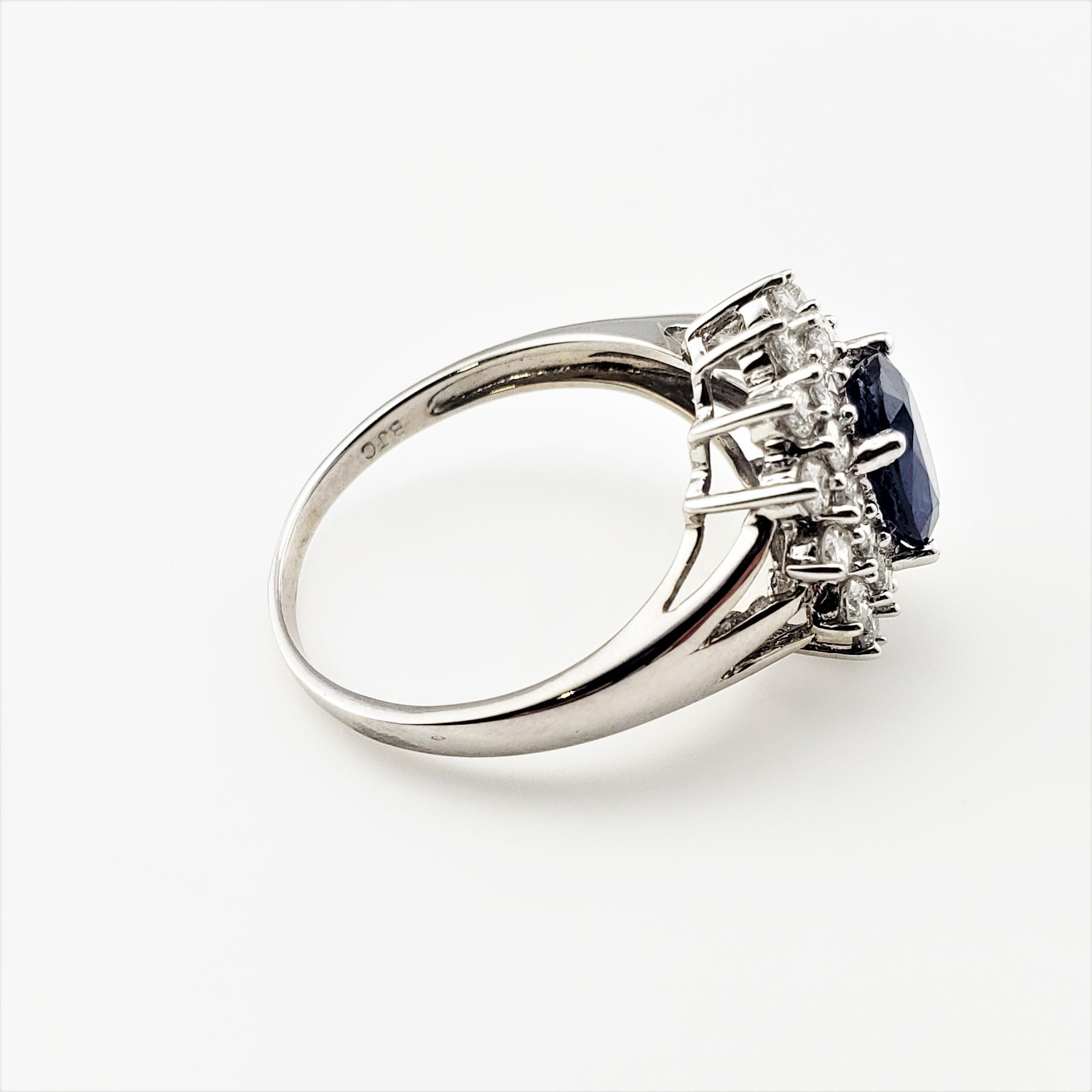 Oval Cut 14 Karat White Gold Sapphire and Diamond Ring For Sale