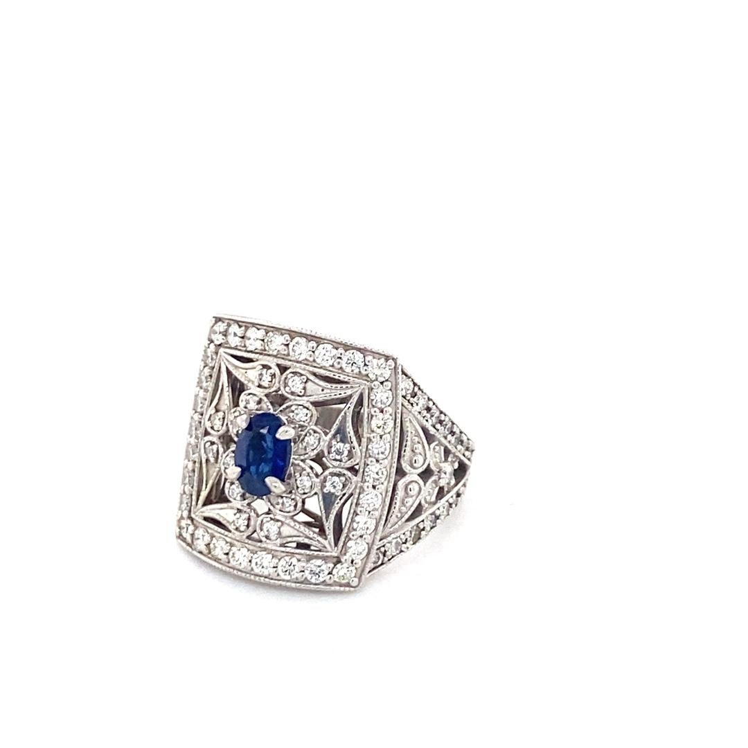 Oval Cut 14 Karat White Gold Sapphire and Diamond Ring For Sale