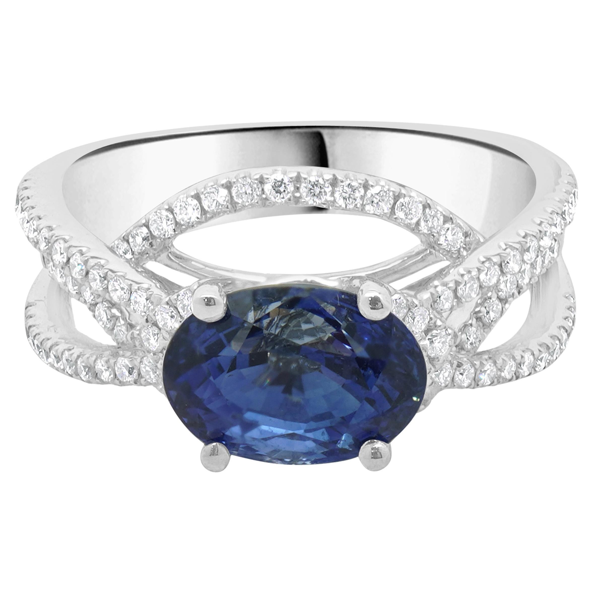 Bague en or blanc 14 carats avec saphir et diamants