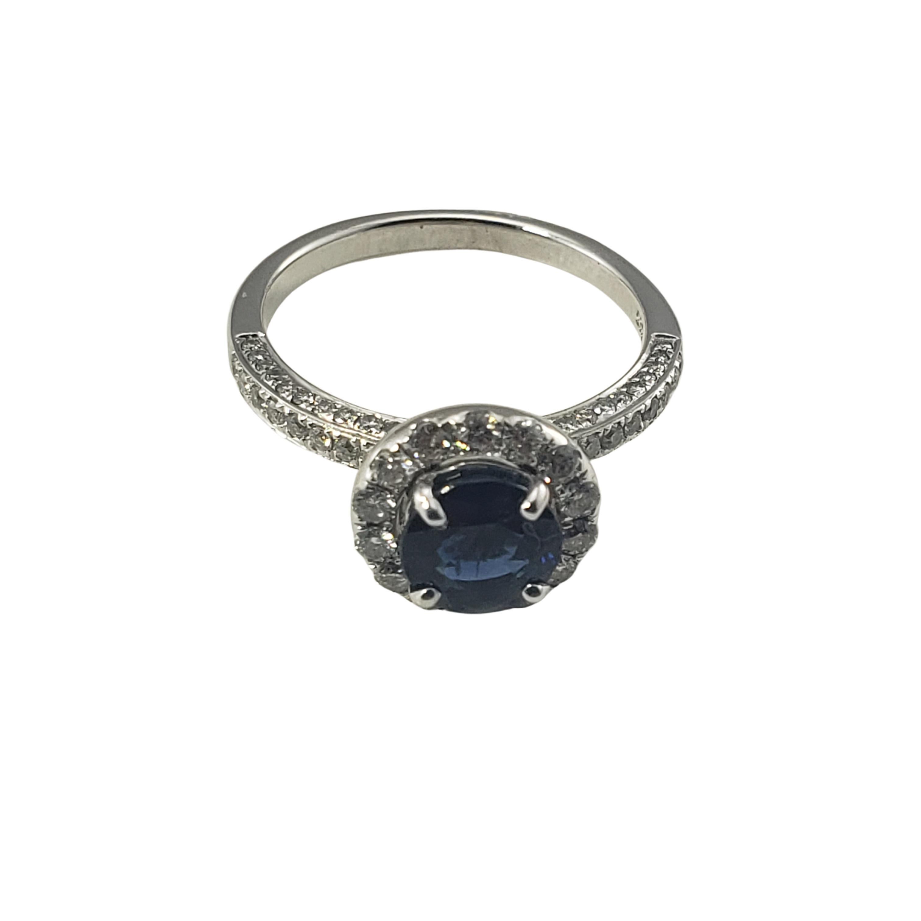 14 Karat White Gold Sapphire and Diamond Ring Size 7 GAI Certified-

This elegant ring features one round sapphire (7 mm) and 84 round brilliant cut diamonds set in classic 14K white gold.  Top of ring measures 10 mm.  Shank: 2 mm.

Total diamond
