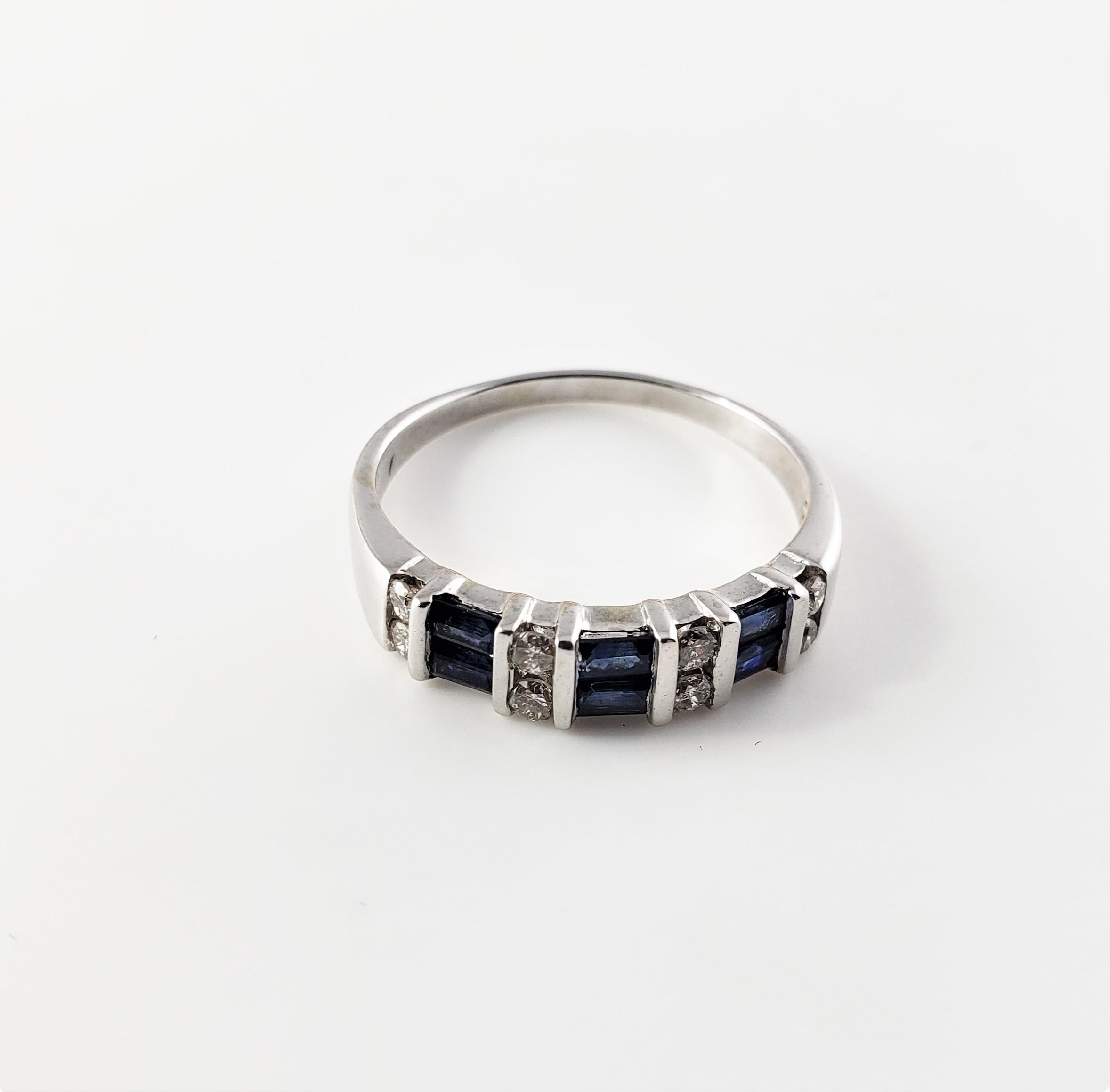 14 Karat White Gold Sapphire and Diamond Ring Size 9.25-

This lovely ring features six baguette sapphires and eight round brilliant cut diamonds set in classic 14K white gold.  Width:  4 mm.  Shank:  2 mm.

Approximate total diamond weight:  .20