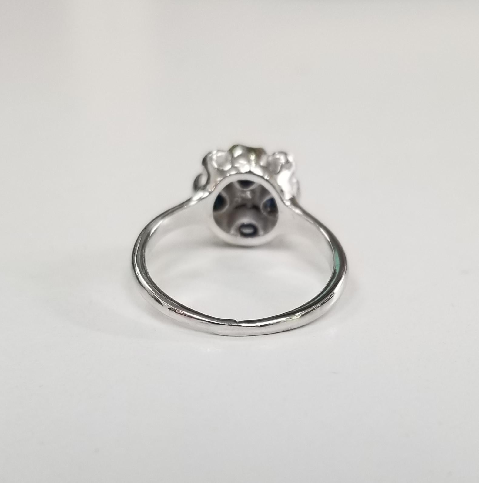 Round Cut 14 Karat White Gold Sapphire and Diamond Ring 