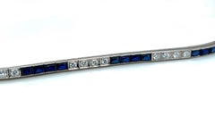 14 Karat White Gold Diamond and Synthetic Sapphire Rivière / Tennis Bracelet