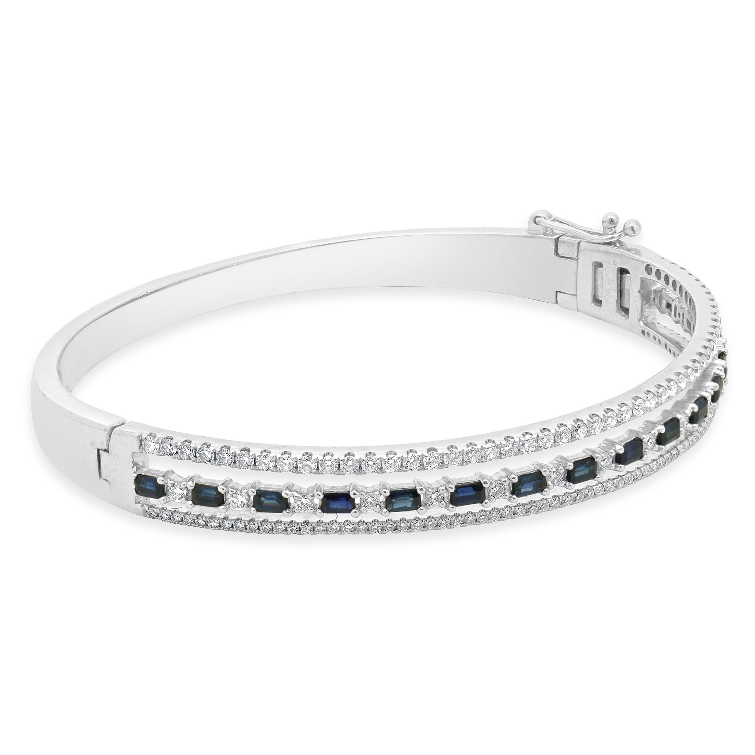 Designer: custom
Material: 14K white gold
Sapphire: 16 baguette cut = 1.60cttw
Diamond: 137 round brilliant cut = 1.13cttw
Color: G / H
Clarity: SI2
Length: bracelet will fit approximately a 6.75-inch wrist
Weight: 21.09 grams

