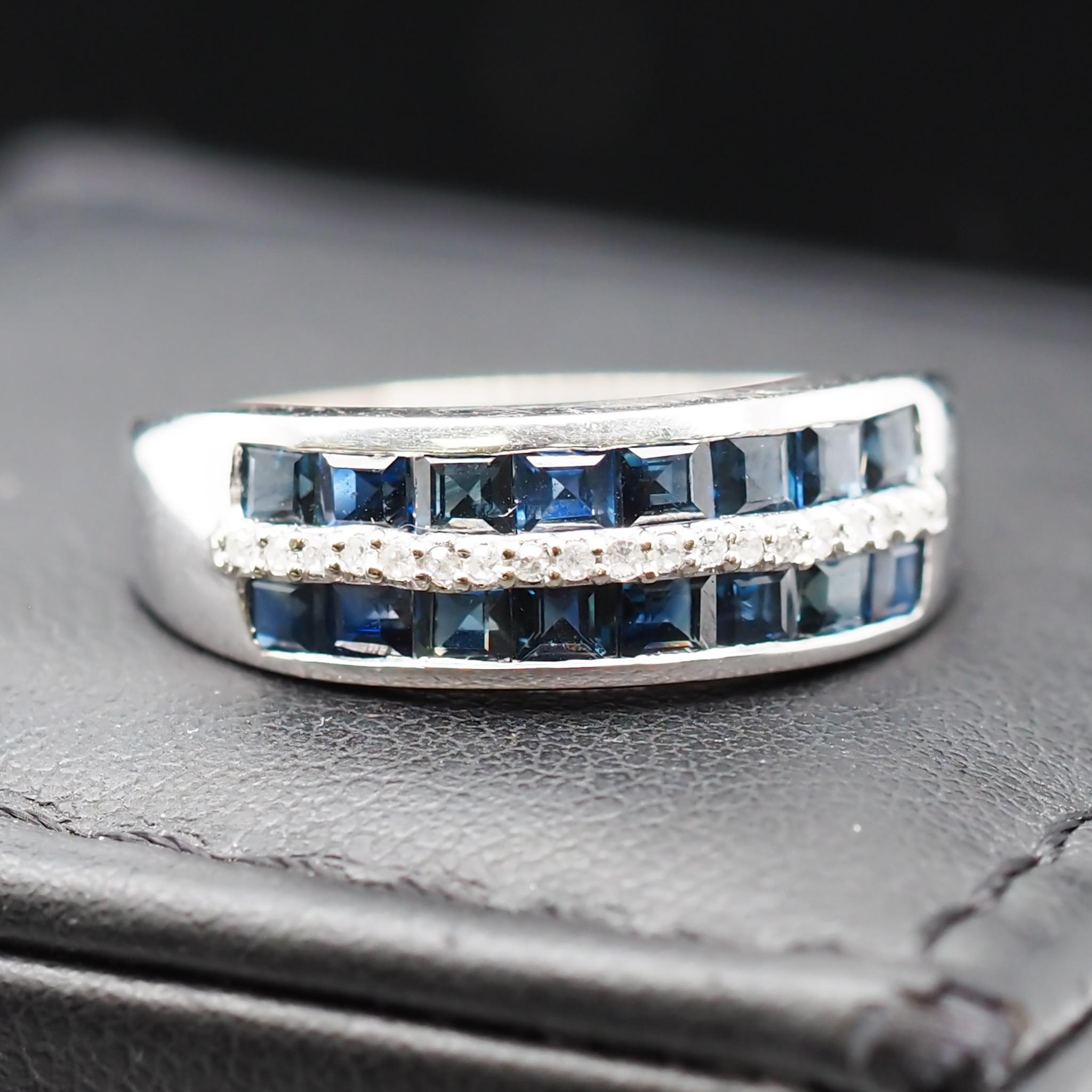 Year: 2000s

Item Details:
Ring Size: 7.25
Metal Type: 14K White Gold [Hallmarked, and Tested]
Weight: 3.0 grams

Diamond Details: .15ct total weight, round brilliant, natural diamonds. H Color, SI Clarity.

Side Stone Details: Sapphires, Natural,