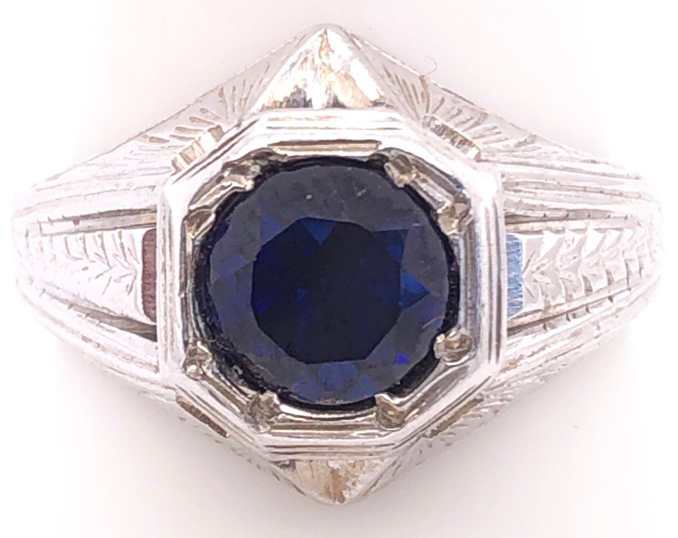 14 Karat White Gold Sapphire Solitaire Ring Size 8.25.
7.67 grams total weight.
