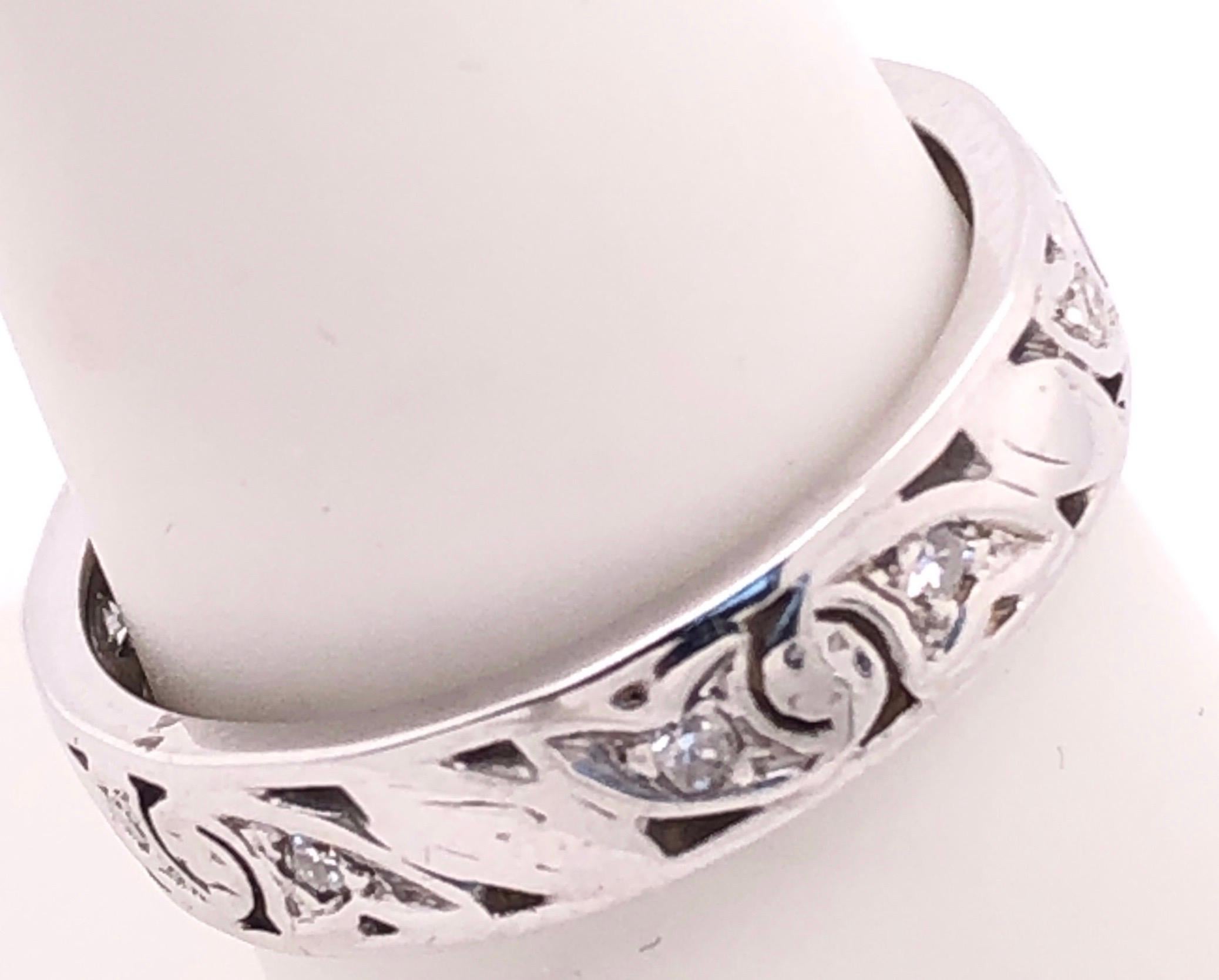 Modern 14 Karat White Gold Scroll Design Eternity Diamond Band Ring For Sale