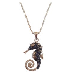 14 Karat White Gold Seahorse Pendant, Sapphires .30 Carat and Diamonds .12 Carat