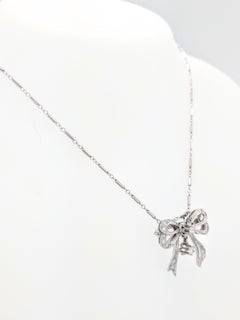14 Karat White Gold Single Cut Diamond Bow Brooch/Pendant Necklace