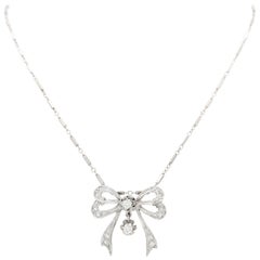 14 Karat White Gold Single Cut Diamond Bow Brooch/Pendant Necklace