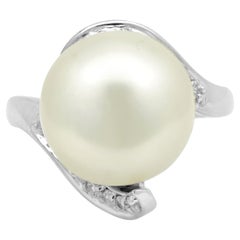 Anello bypass con perla dei mari del sud e diamante rotondo in oro bianco 14 carati