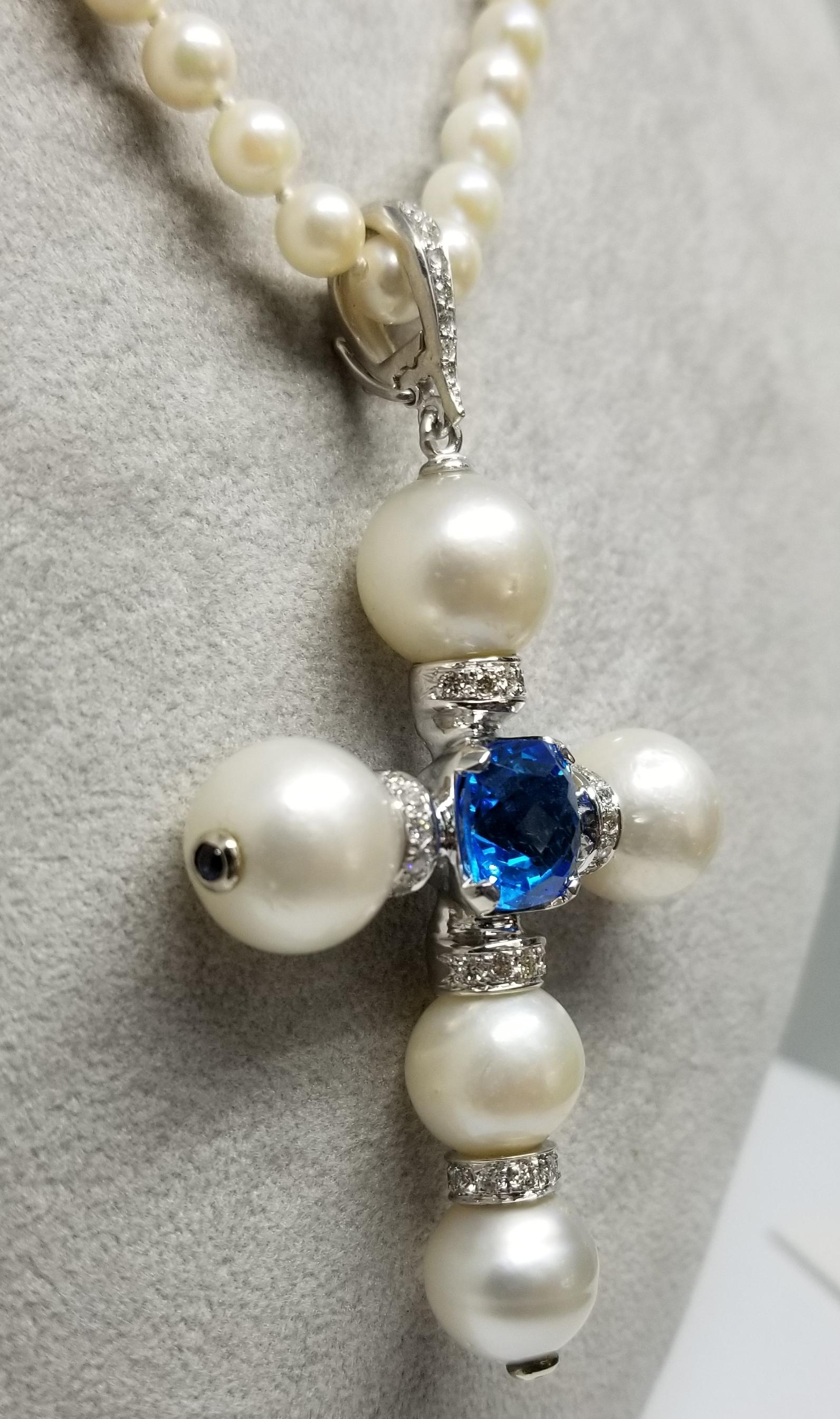 Cushion Cut 14 Karat White Gold South Sea Pearl Cross with a Swiss Blue Topaz and Diamonds For Sale