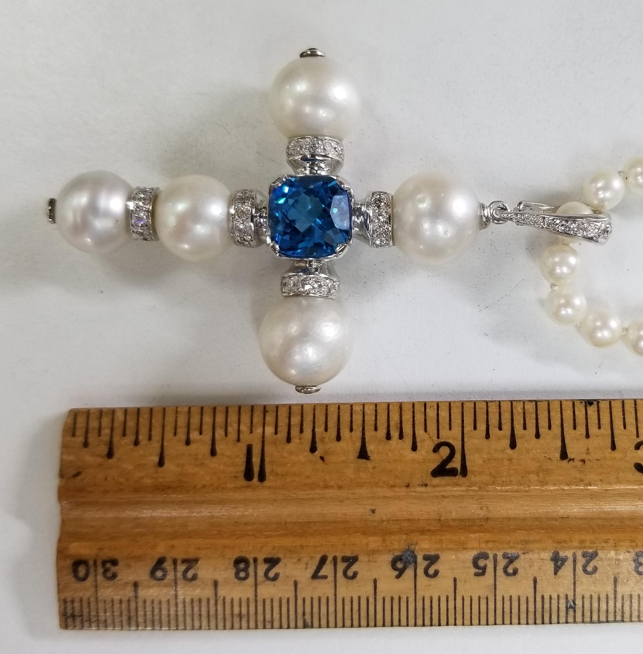 14 Karat White Gold South Sea Pearl Cross with a Swiss Blue Topaz and Diamonds In New Condition For Sale In Los Angeles, CA