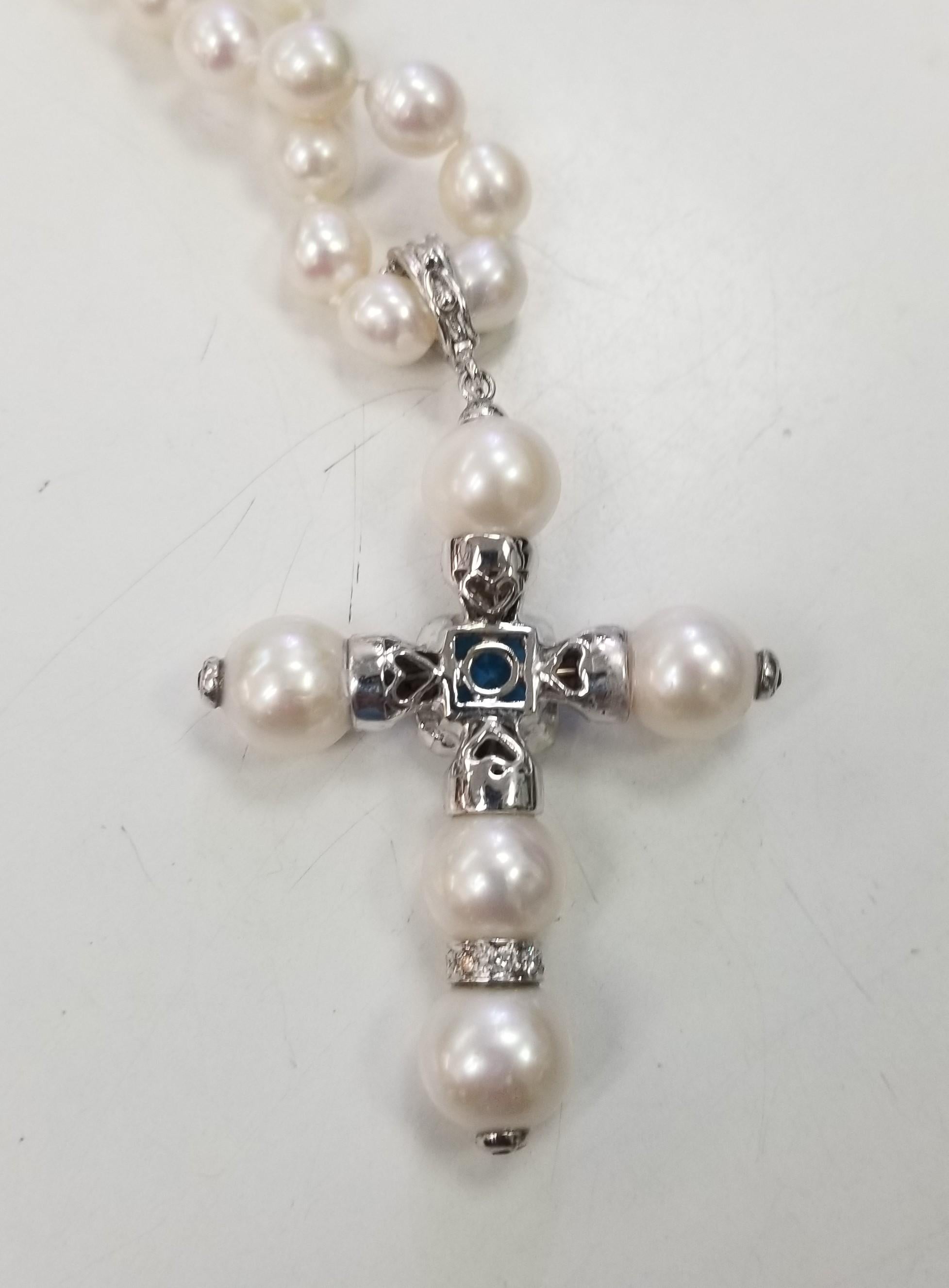 Women's or Men's 14 Karat White Gold South Sea Pearl Cross with a Swiss Blue Topaz and Diamonds For Sale