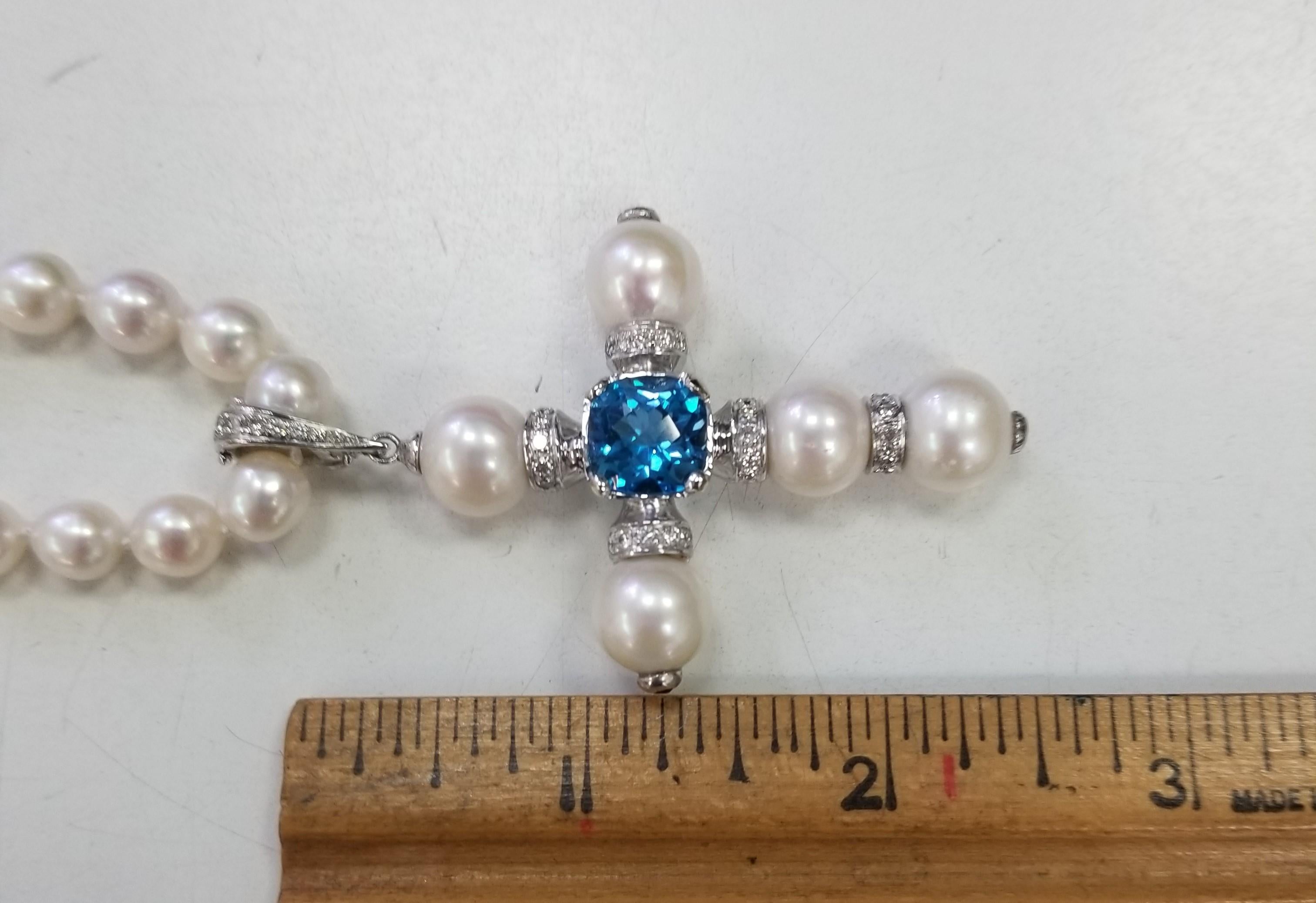 14 Karat White Gold South Sea Pearl Cross with a Swiss Blue Topaz and Diamonds For Sale 2