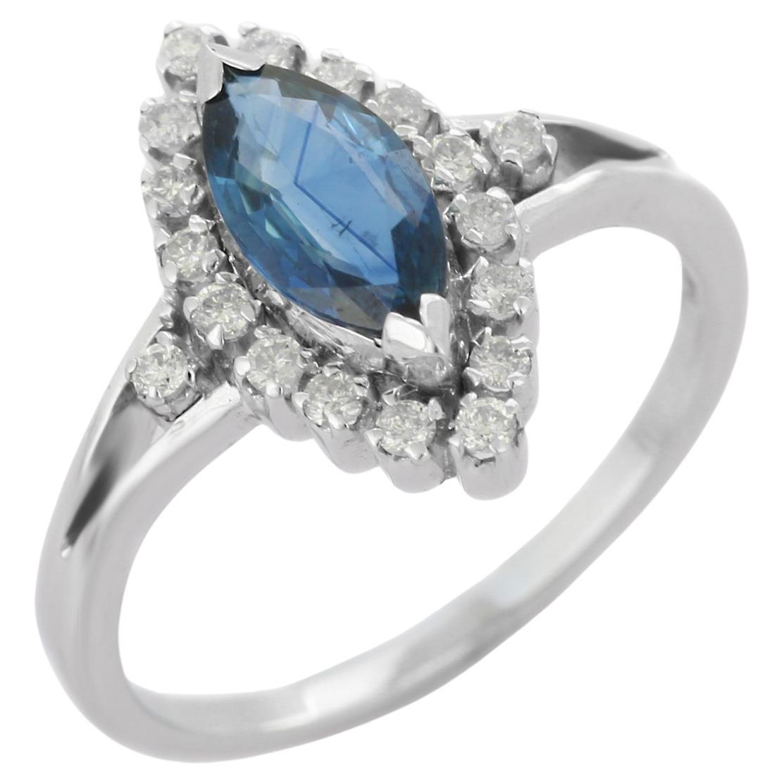 14 Karat White Gold Studded Marquise Blue Sapphire Diamond Wedding Ring
