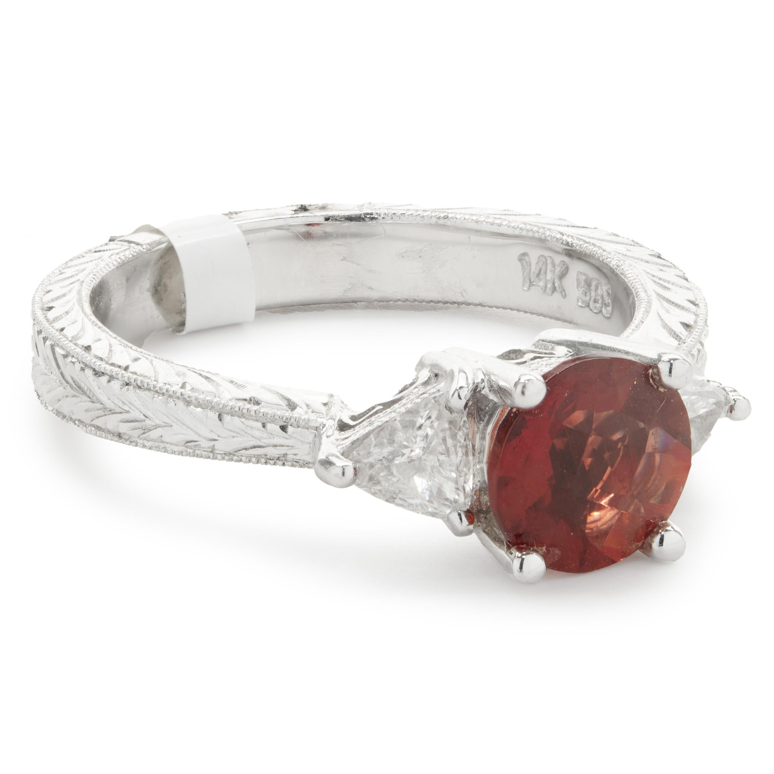Designer: custom
Material: 14K white gold
Sunstone: 1 round checker board cut = 0.91ct
Diamond: 2 trillion cut = 0.30cttw
Color: H
Clarity: SI1
Ring Size: 6.25 (please allow up to 2 additional business days for sizing requests)
Dimensions: ring top