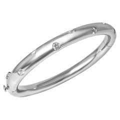 14 Karat White Gold T-7 with 7 Round Diamonds 0.70 Carat Bangle by Manart