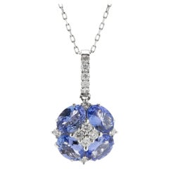 14 Karat White Gold Tanzanite and Diamond Flower Necklace 14 Karat White Gold Tanzanite and Diamond Flower Necklace