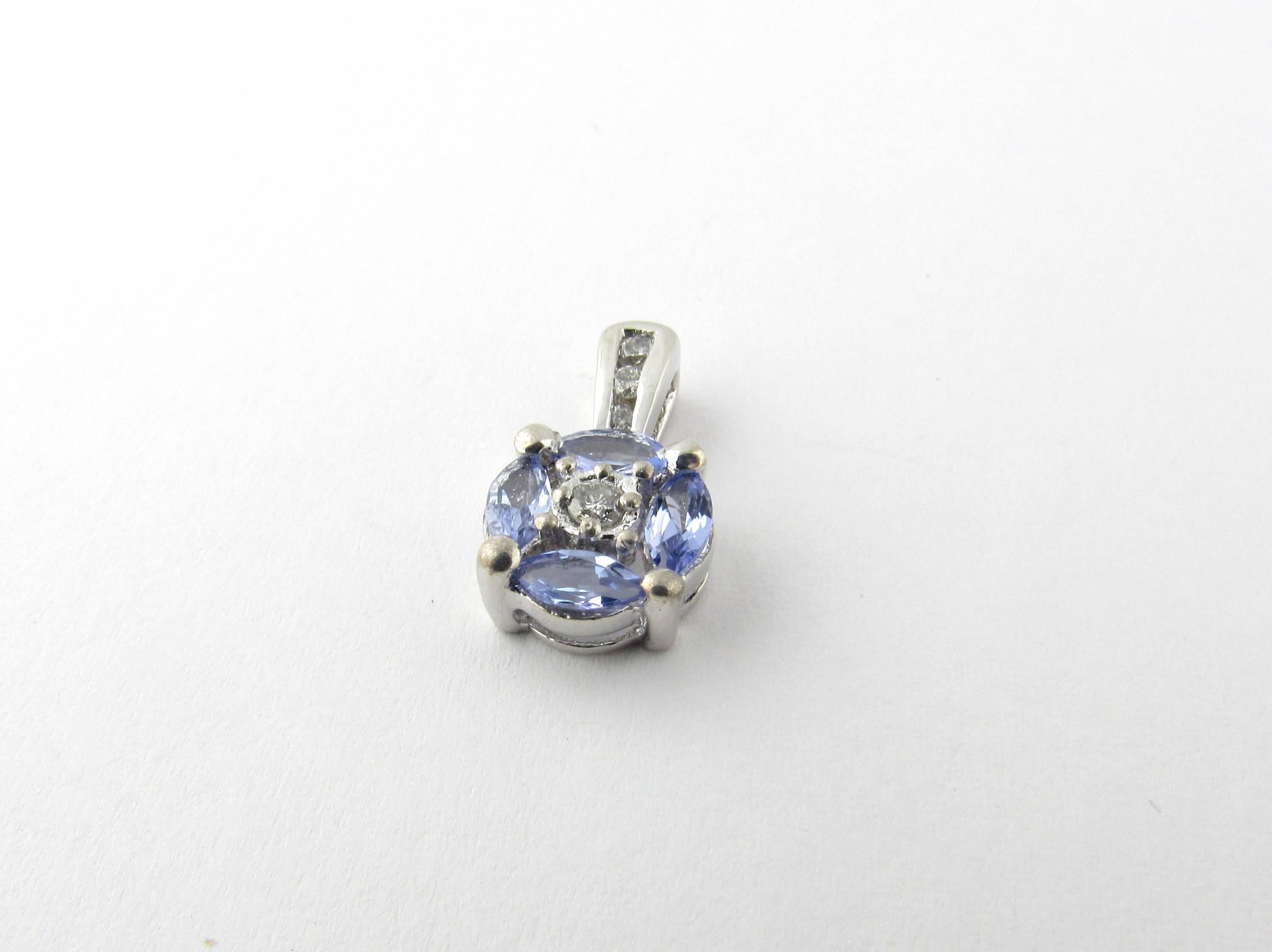 Vintage 14 Karat White Gold Tanzanite and Diamond Pendant- 
This lovely pendant features four marquis tanzanite stones accented with four round brilliant cut diamond set in 14K white gold. 
Approximate total diamond weight: .07 ct. 
Diamond color: I