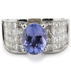 14 Karat White Gold Tanzanite and Invisible Set Diamond Ring