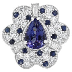 14 Karat White Gold Tanzanite, Sapphire & Diamond Flower Ring