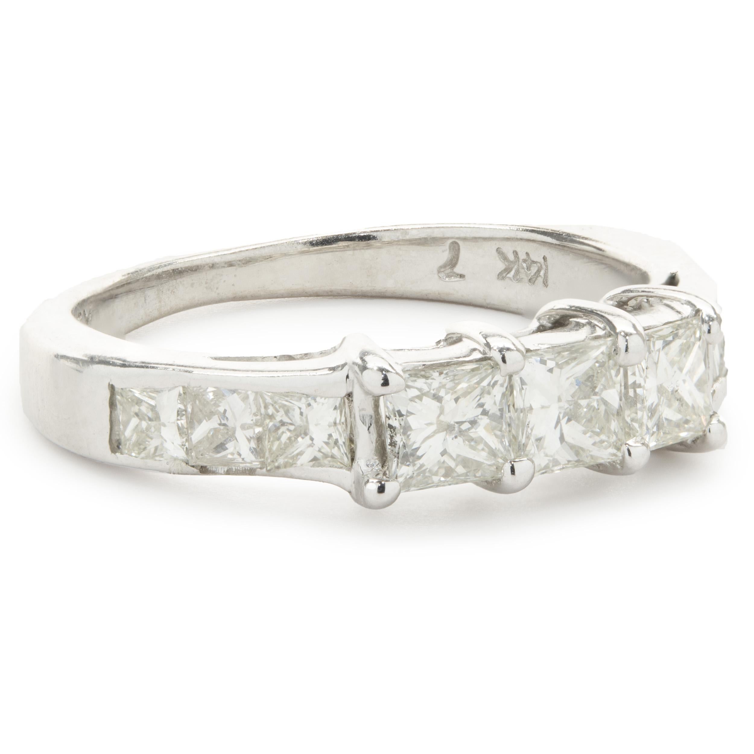Designer: custom
Material: 14K white gold
Diamond: 9 princess cut = .65cttw
Color: G
Clarity: SI1
Size: 5 complimentary sizing available 
Weight: 3.01 grams