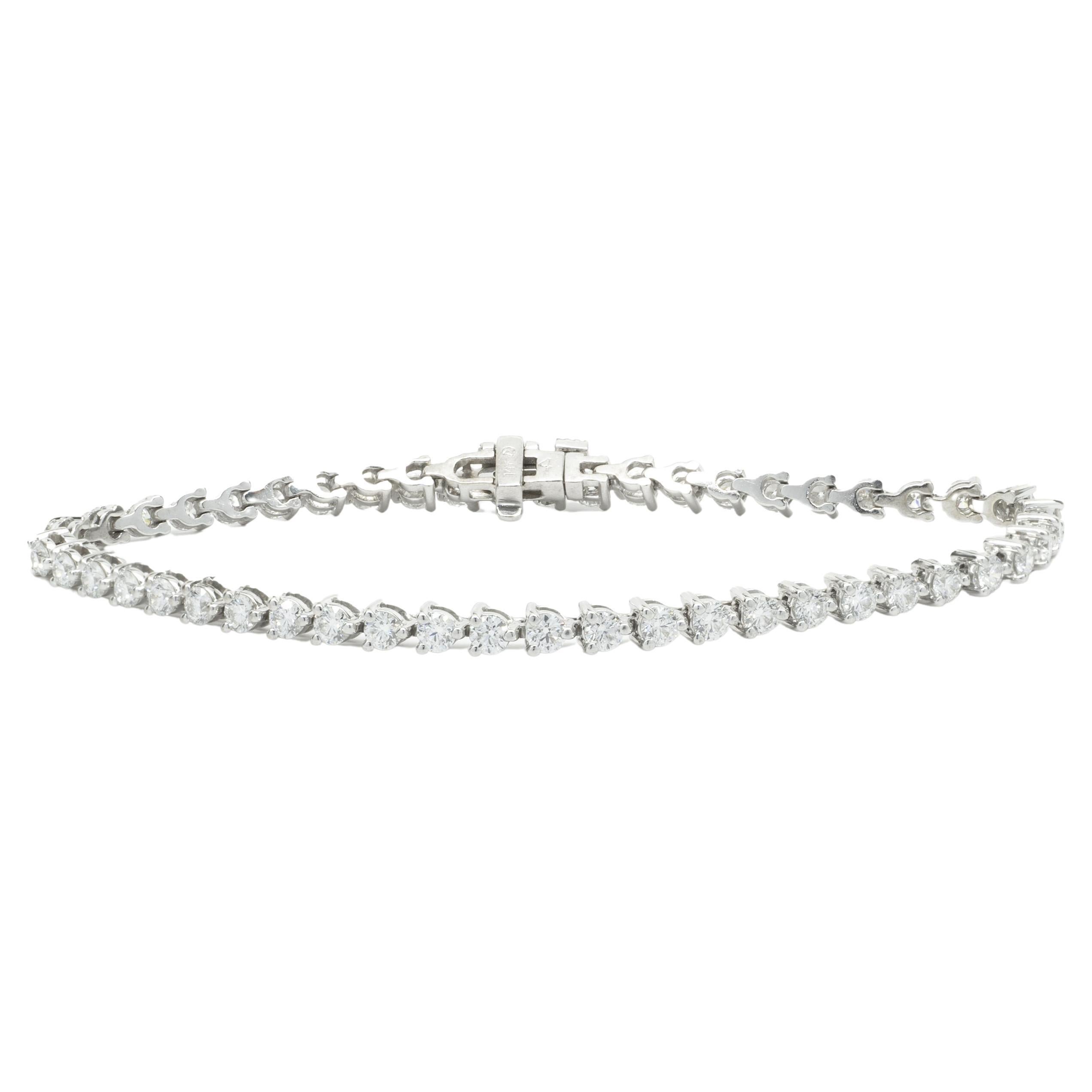 14 Karat Weißgold Diamant-Tennisarmband mit drei Zacken