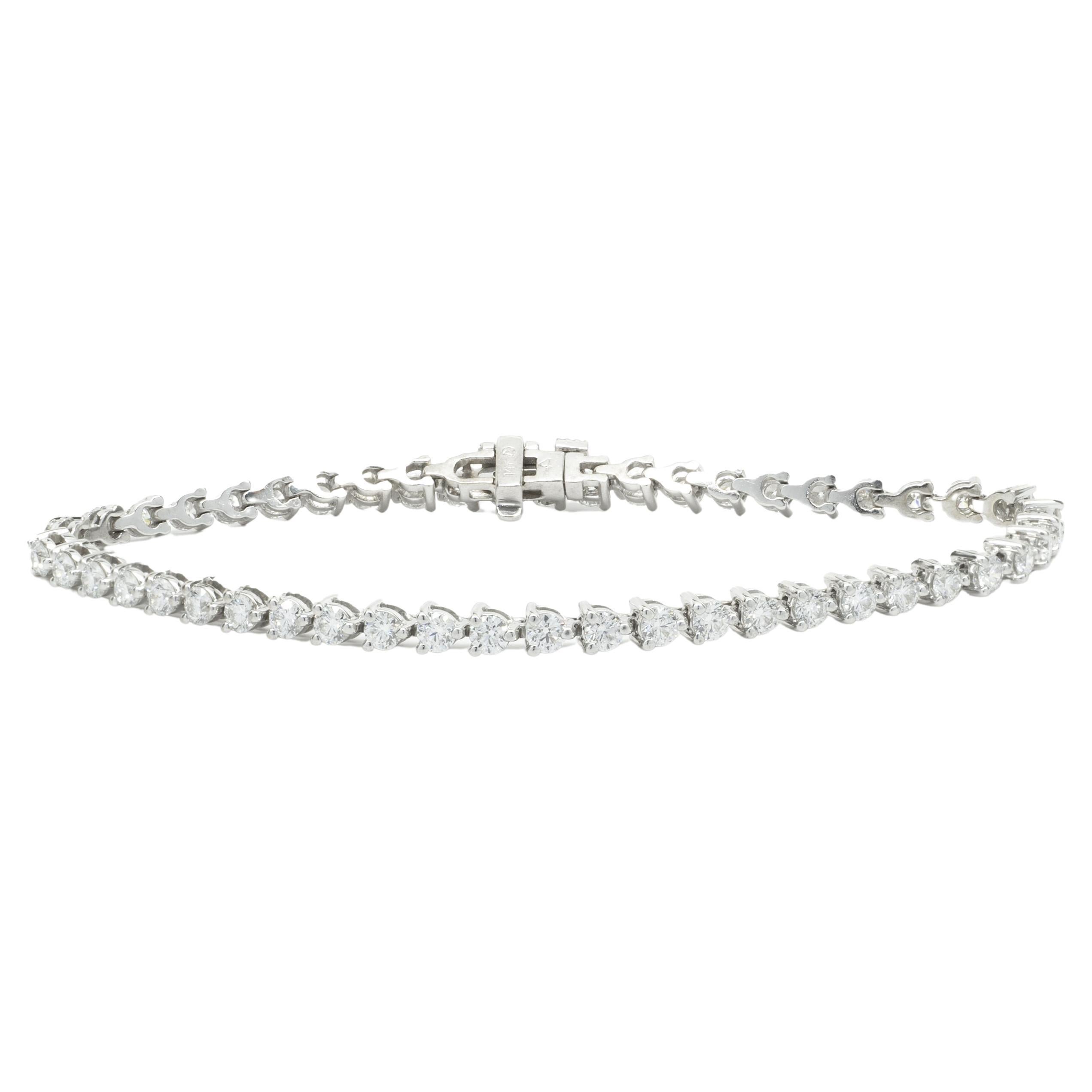 14 Karat White Gold Three Prong Diamond Tennis Bracelet For Sale