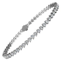 Bracelet tennis en or blanc 14 carats à trois griffes avec diamants de 4 carats