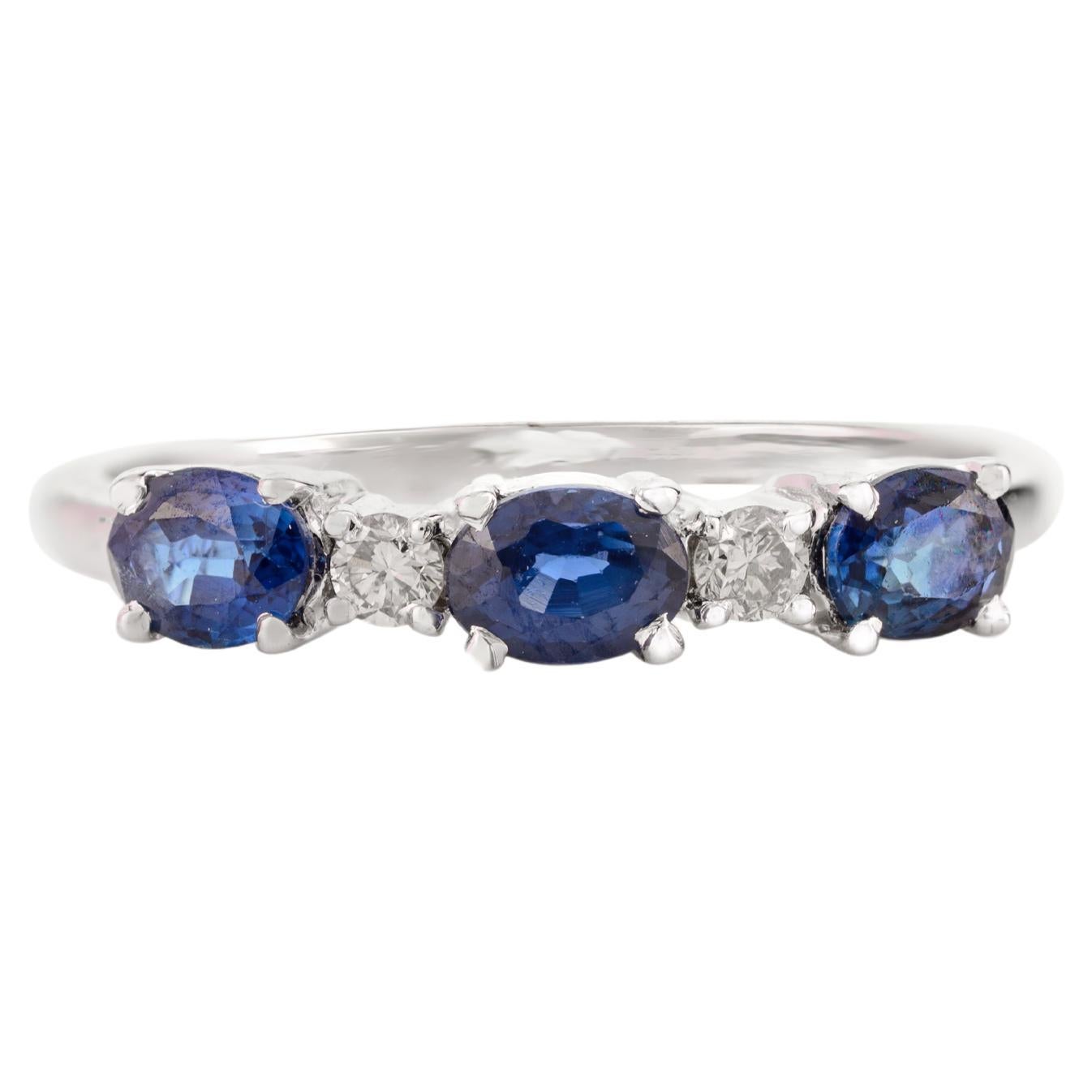 For Sale:  14 Karat White Gold Three Stone 0.78 CTW Blue Sapphire and Diamond Ring for Her