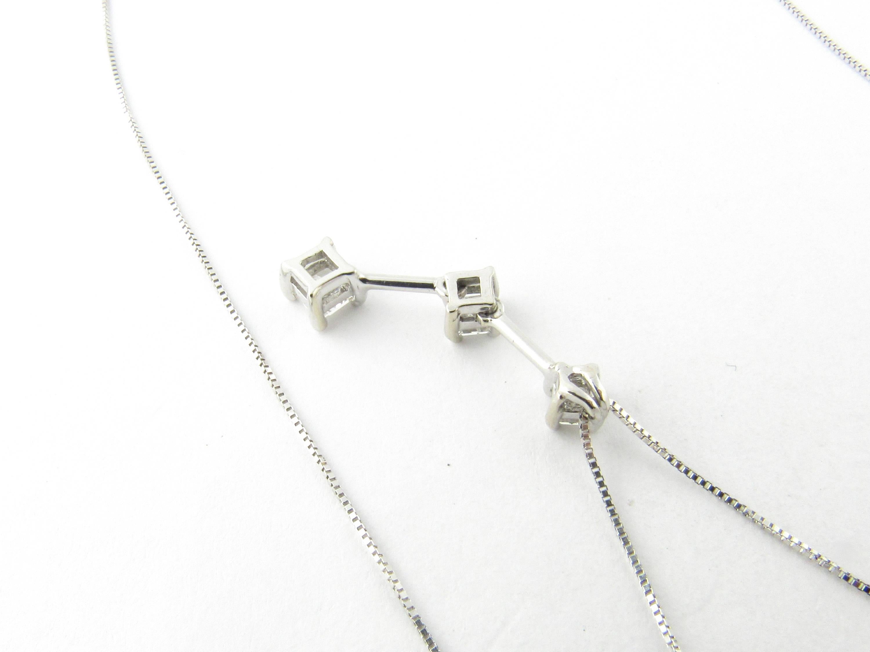 Women's 14 Karat White Gold Three-Stone Diamond Pendant Necklace