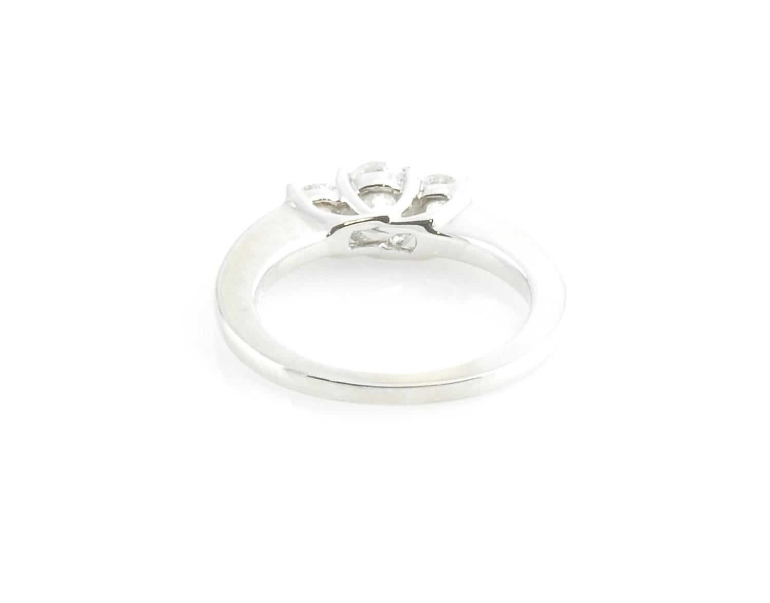 Round Cut 14 Karat White Gold Three-Stone Diamond Ring For Sale