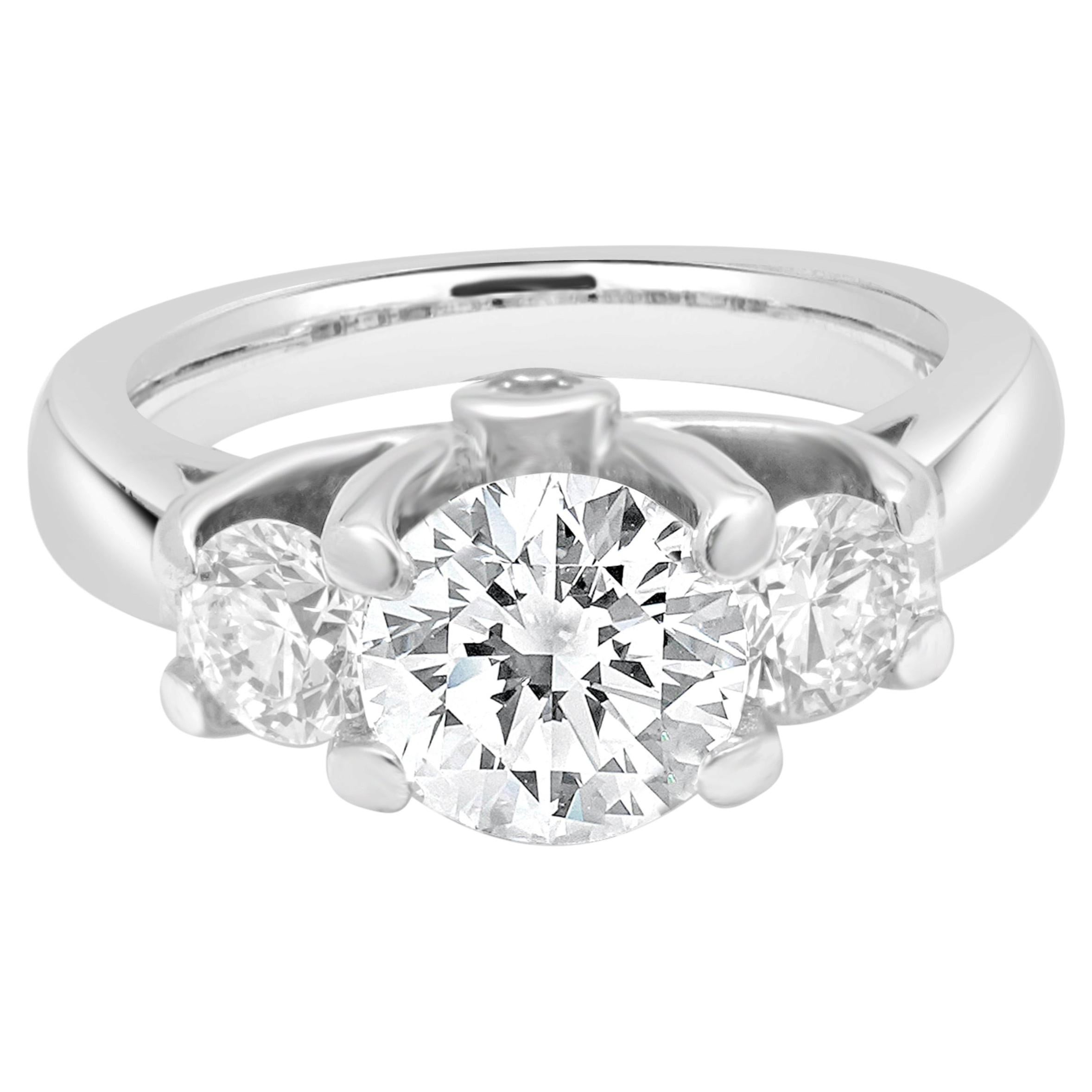 14 Karat White Gold Three Stone Diamond Ring w/ 2 Round Diamond Accents For Sale