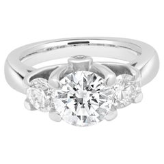 14 Karat White Gold Three Stone Diamond Ring w/ 2 Round Diamond Accents